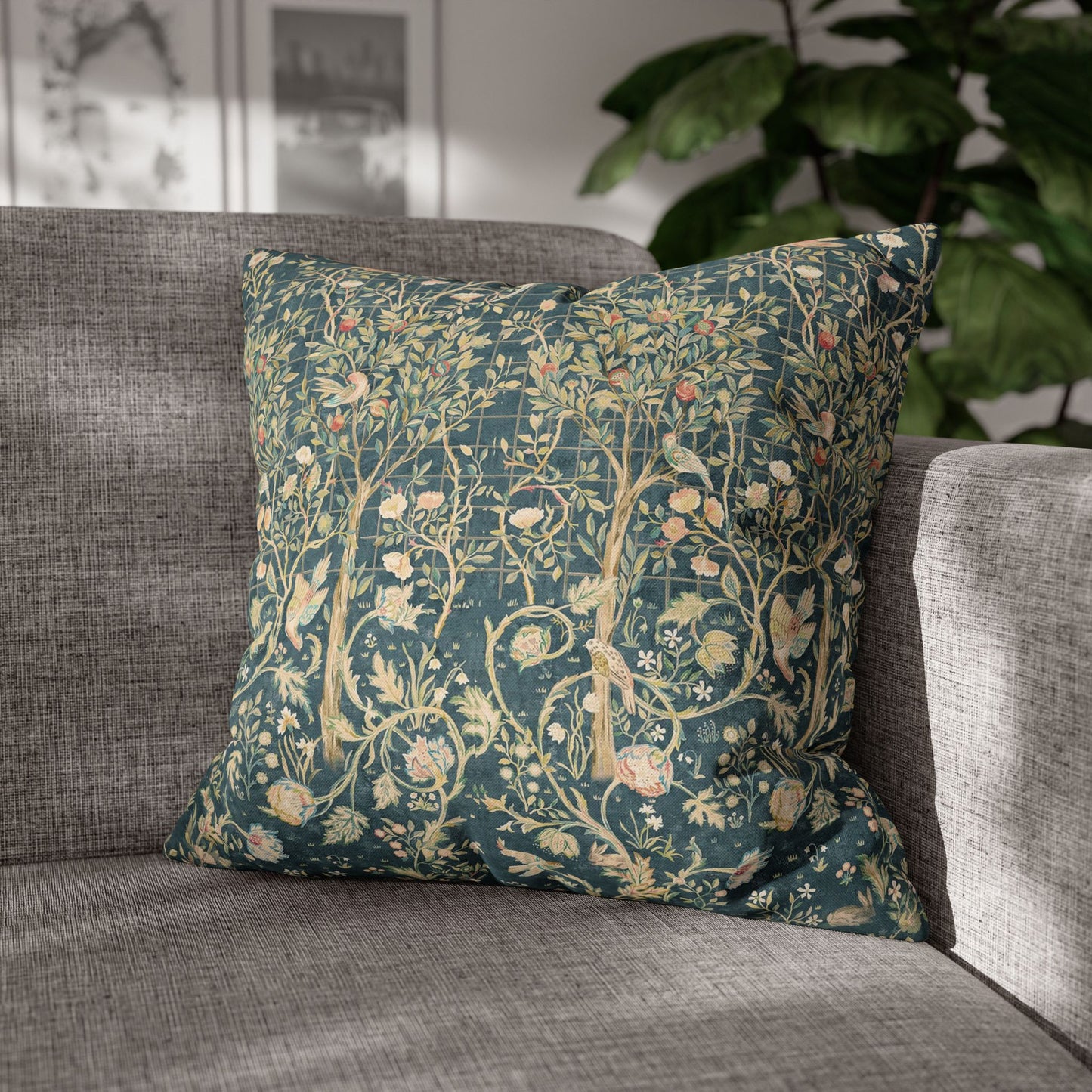 Decorative pillow with floral pattern on a gray sofa