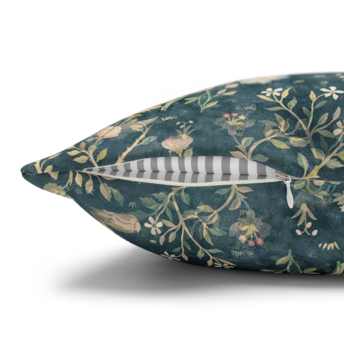 Decorative pillow with floral pattern on a white background