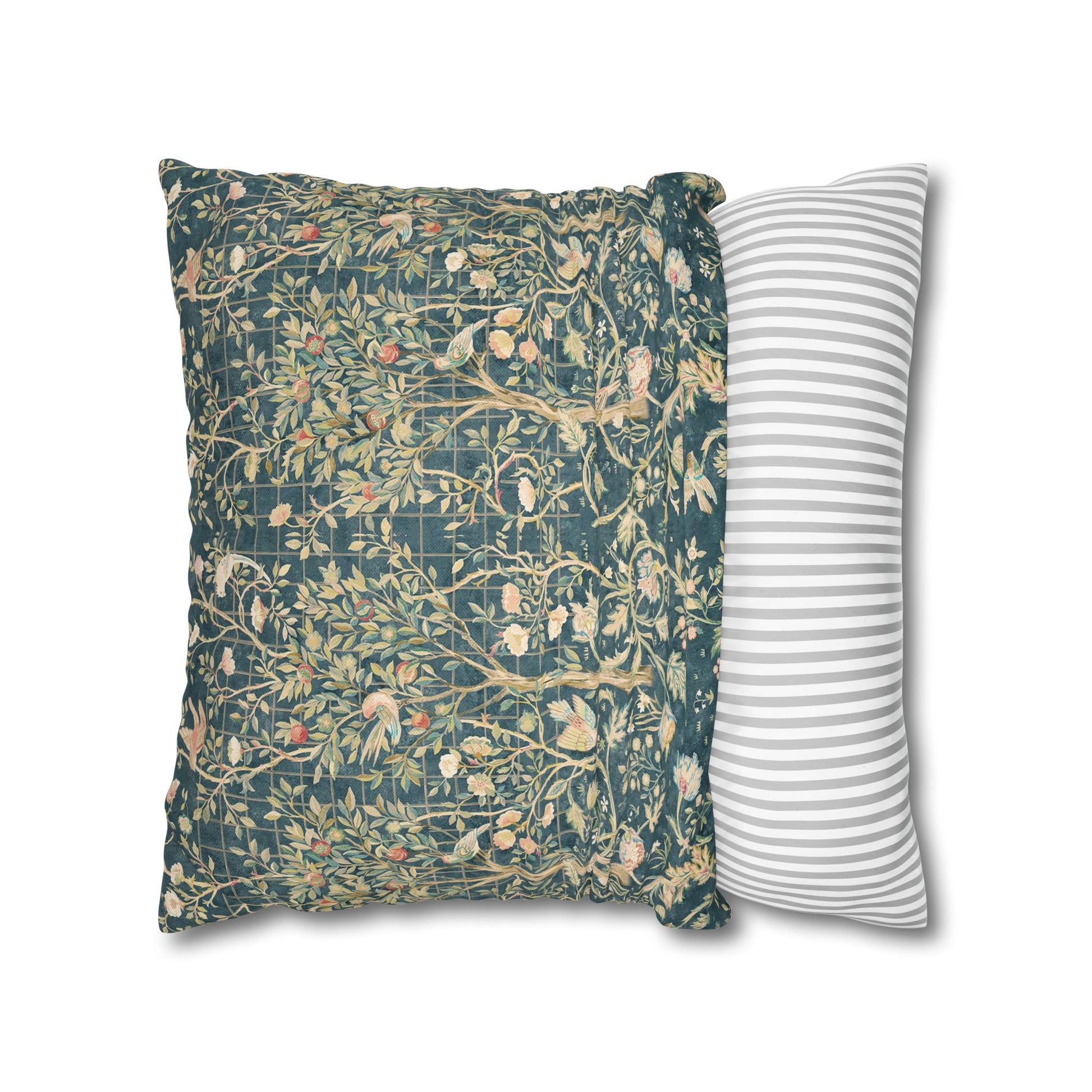 Two pillows, one with floral pattern and one with stripes, on a white background