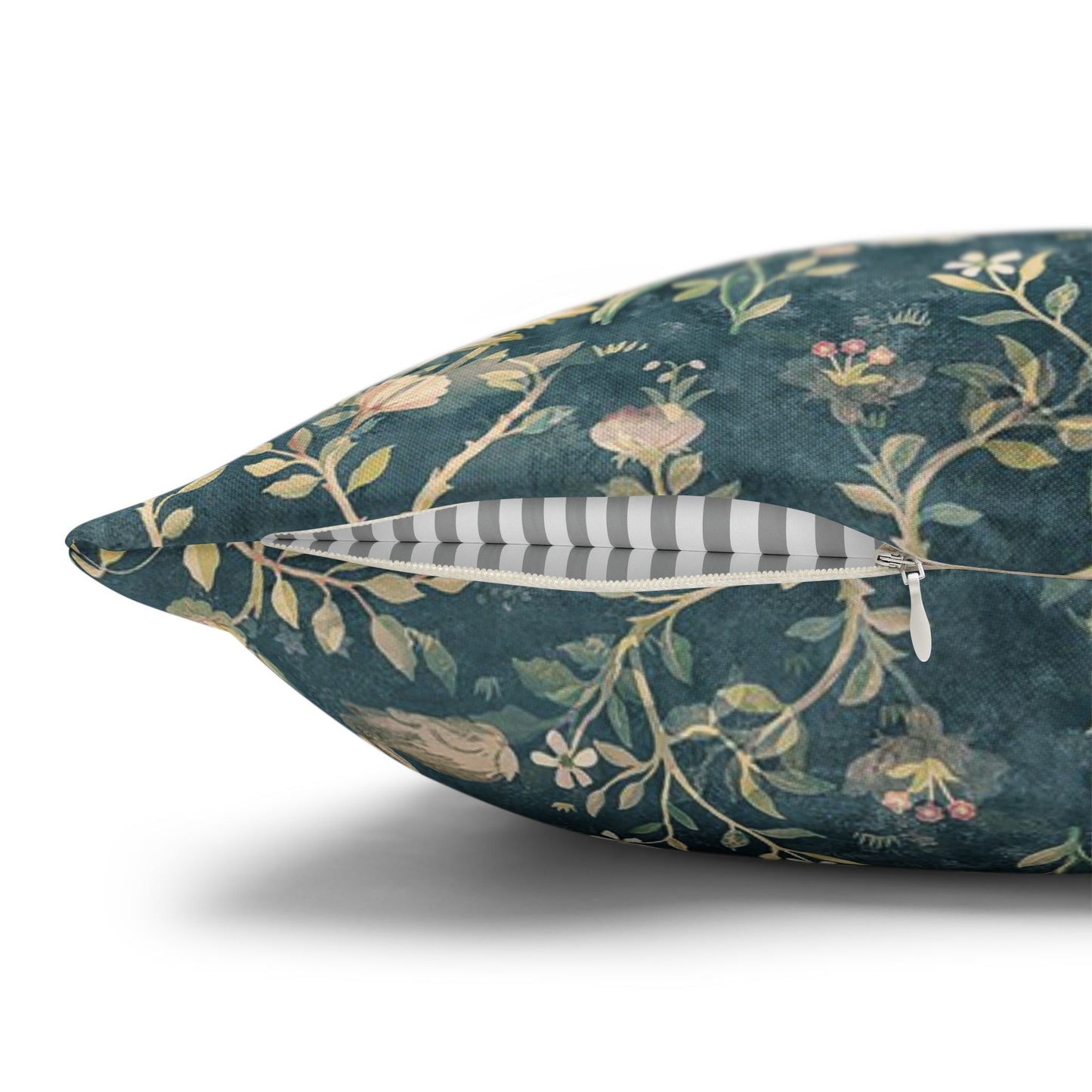 Decorative pillow with floral pattern on a white background