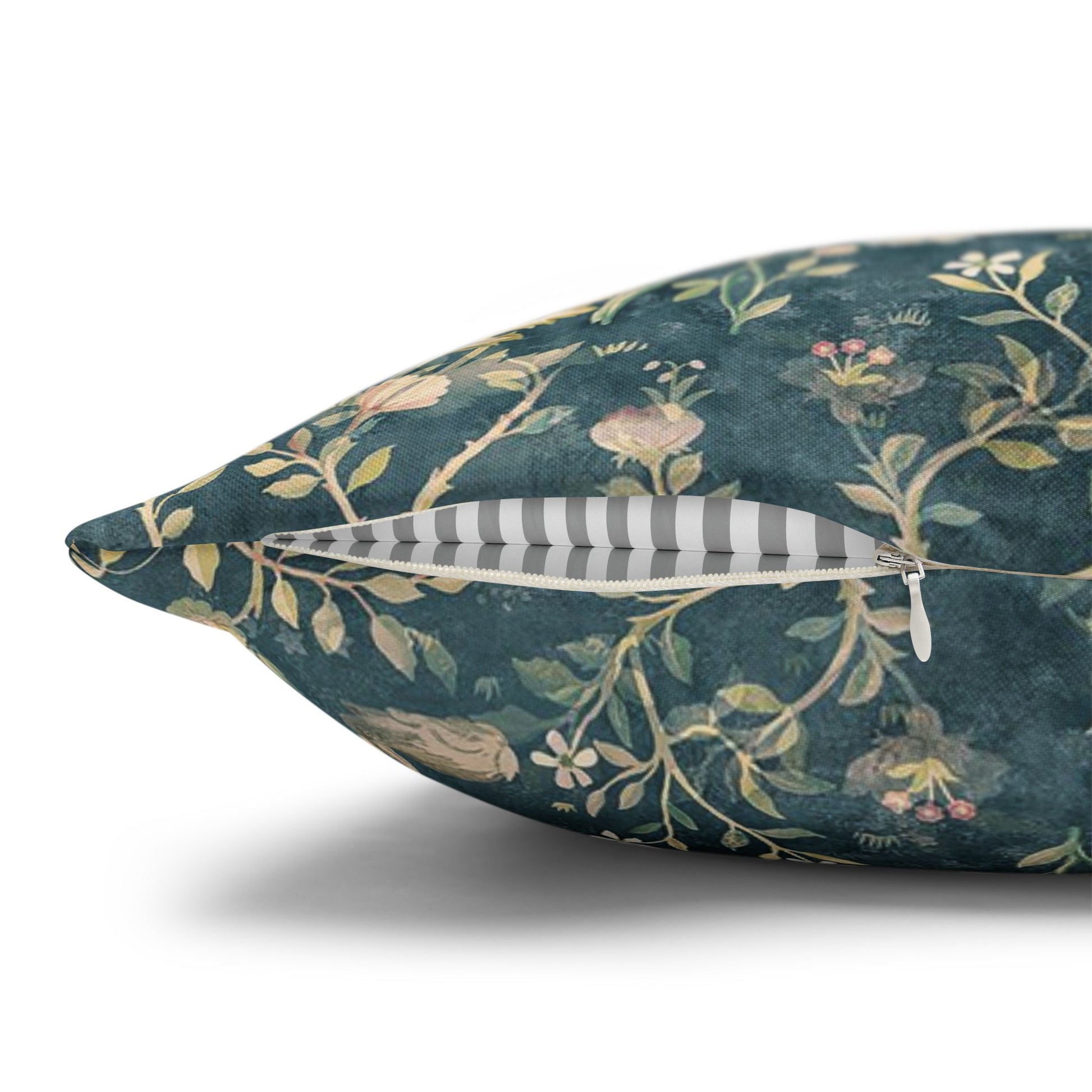 Decorative pillow with floral pattern on a white background