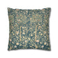 Decorative pillow with floral and bird pattern on a white background