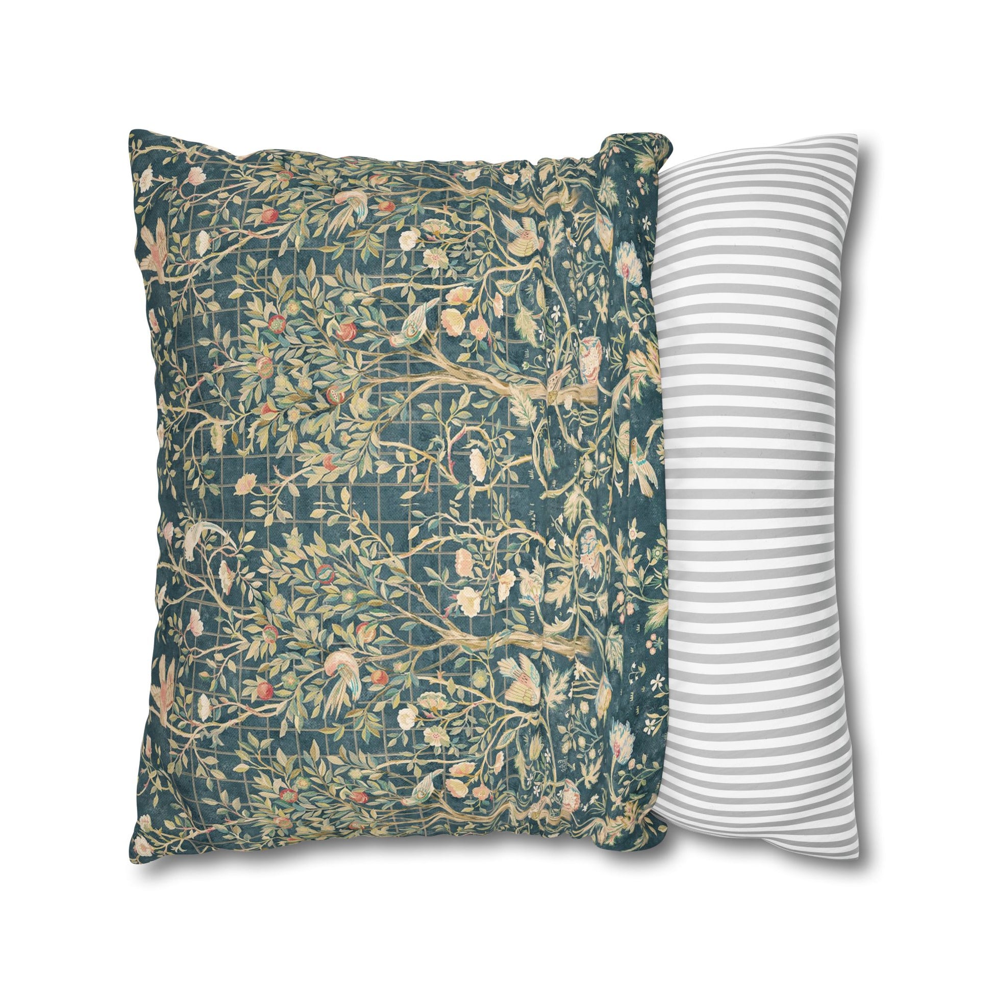 Two pillows, one with floral pattern and one with stripes, on a white background