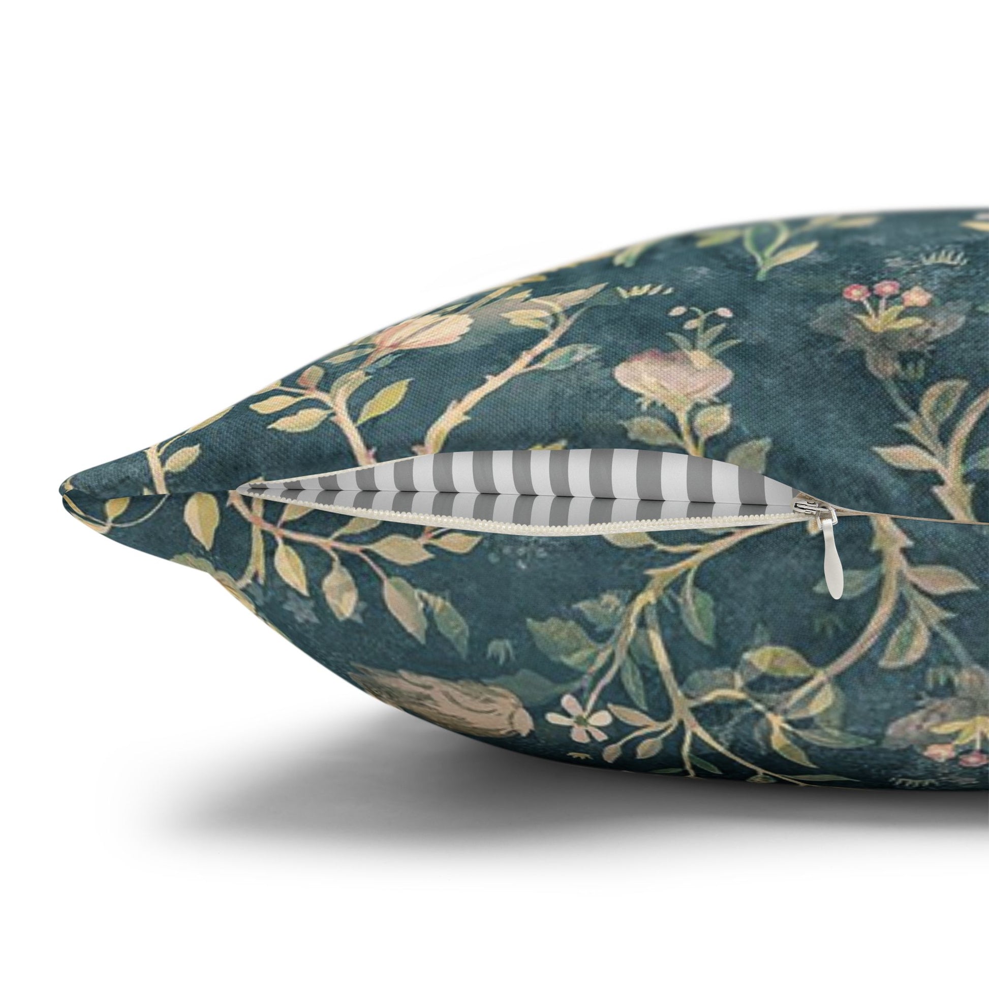 Decorative pillow with floral pattern on a white background