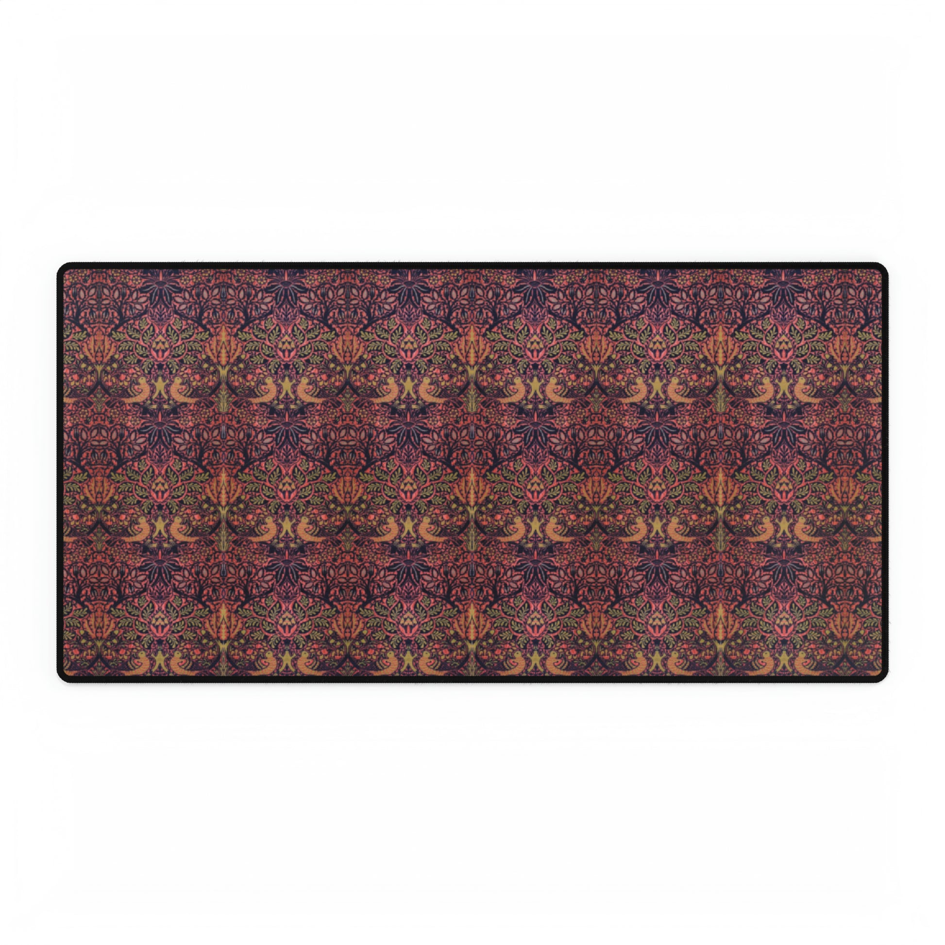 A large desk mat with a floral pattern, displayed on a desk with a keyboard and mouse, with a decorative border.