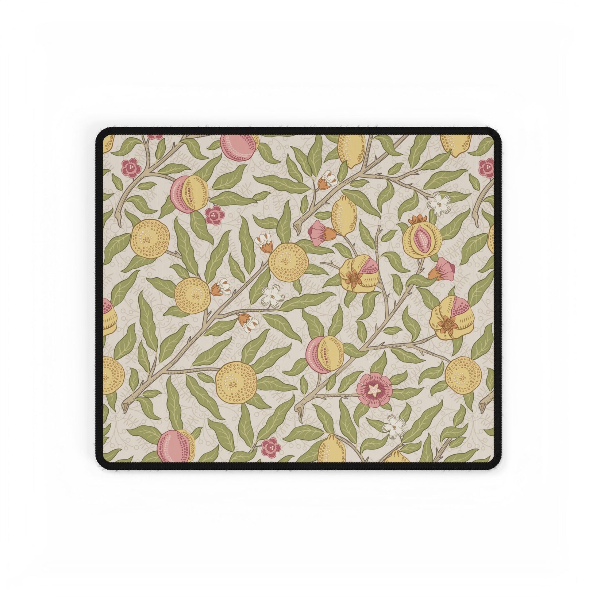 Floral patterned mouse pad with peach and leaf design on a beige background