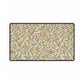 Floral patterned rug with yellow flowers and green leaves on a beige background