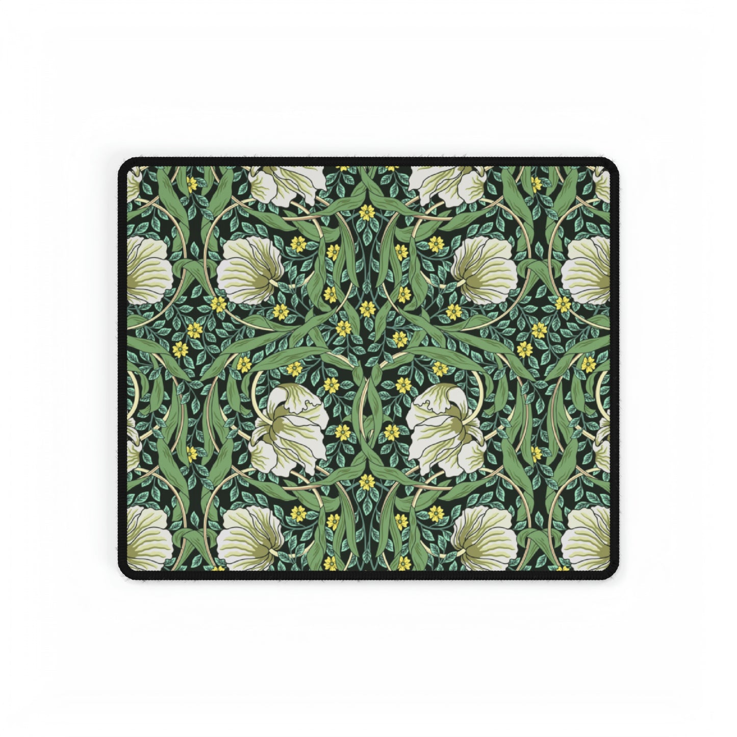 A rectangular desk mat with a green floral pattern, featuring a mouse pad on top. The desk mat is placed under a whiteboard with a digital display and a keyboard.