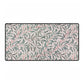 Patterned doormat with leaf design on a white background