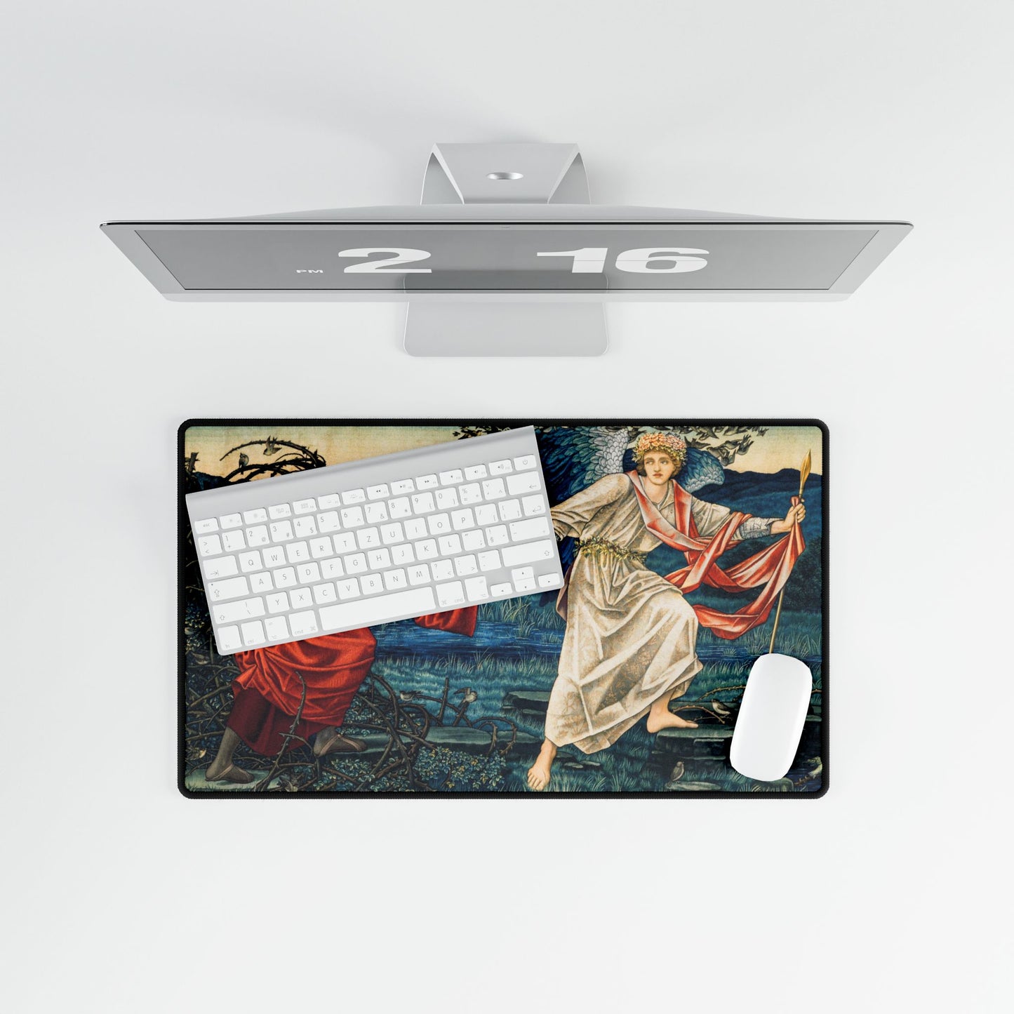 A desk mat with a floral and religious artwork design, accompanied by a computer keyboard and mouse on top of it, set against a white background.