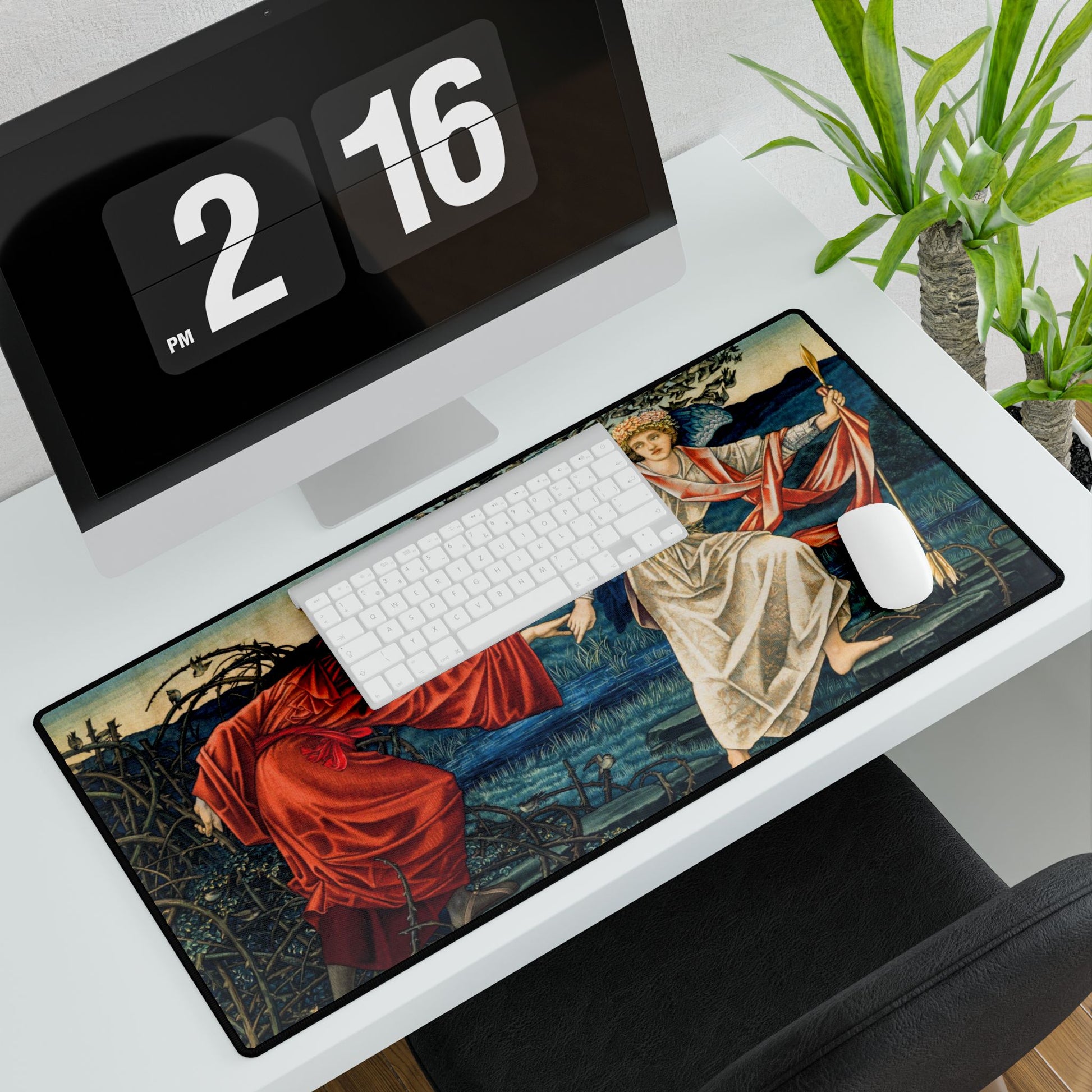 A desk mat with a floral and religious artwork design, accompanied by a computer keyboard and mouse on top of it, set against a white background.