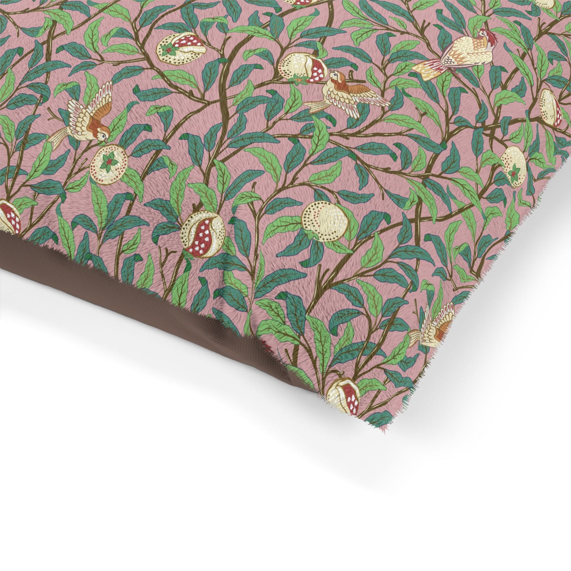 Fabric with a floral pattern on a pink background