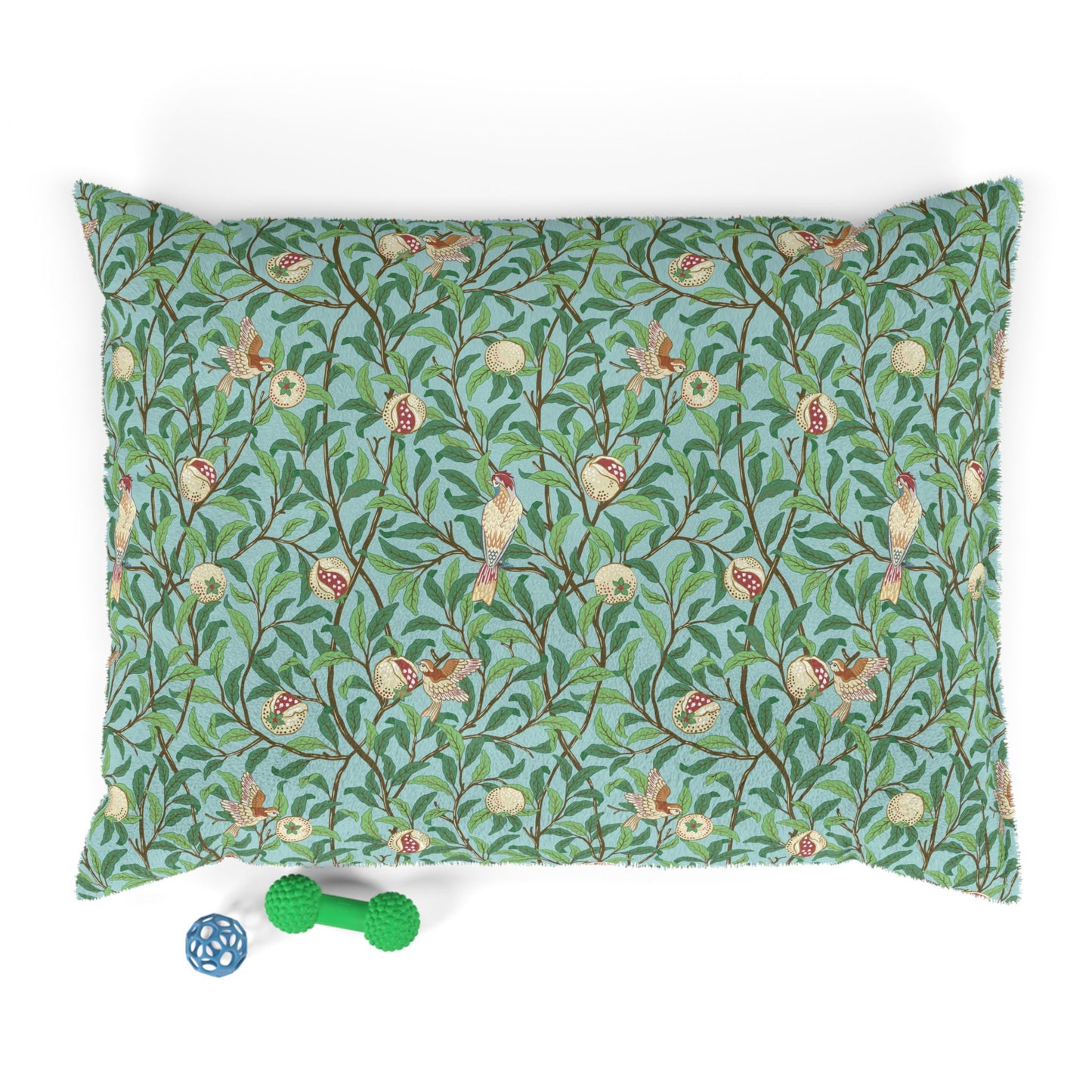 Decorative dog pillow with floral William Morris & Co pattern on a white background