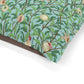 Fabric with a William Morris & Co nature-themed pattern featuring leaves, fruits, and birds on a blue background.