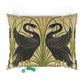 Decorative pillow with swan design on a beige background