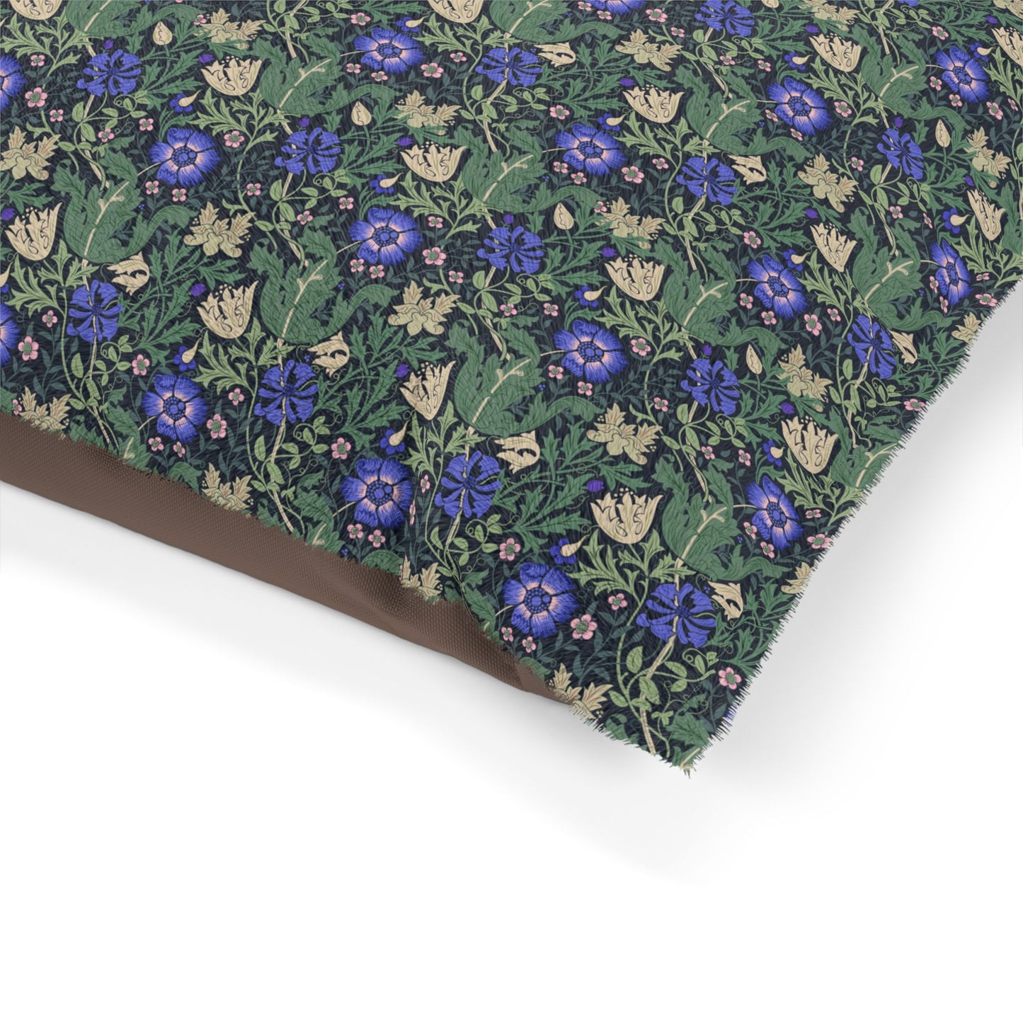 Floral patterned fabric with blue flowers on a green background