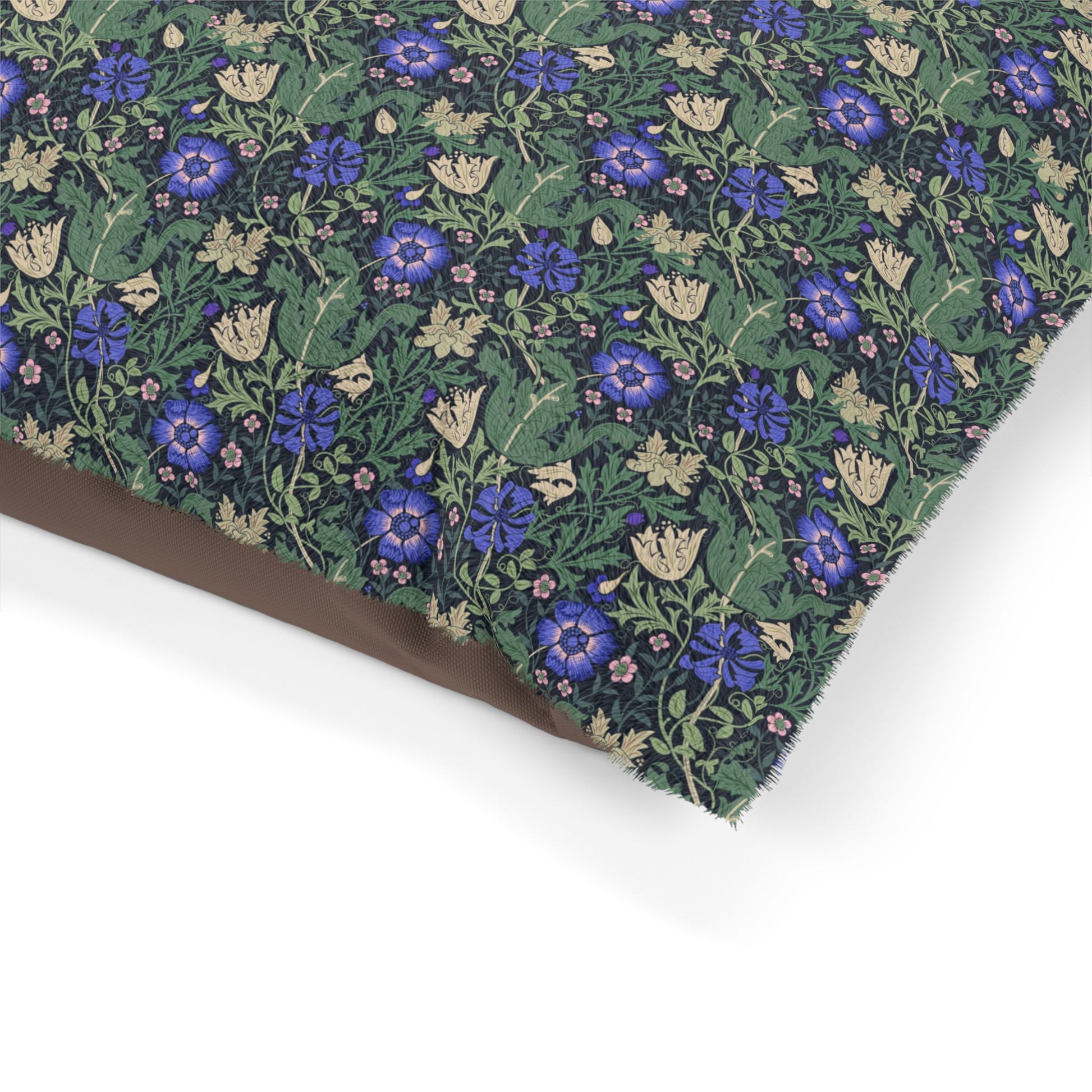 Floral patterned fabric with blue flowers on a green background