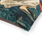 Close-up of a dog bed pillow with a person sitting on grass, surrounded by nature.