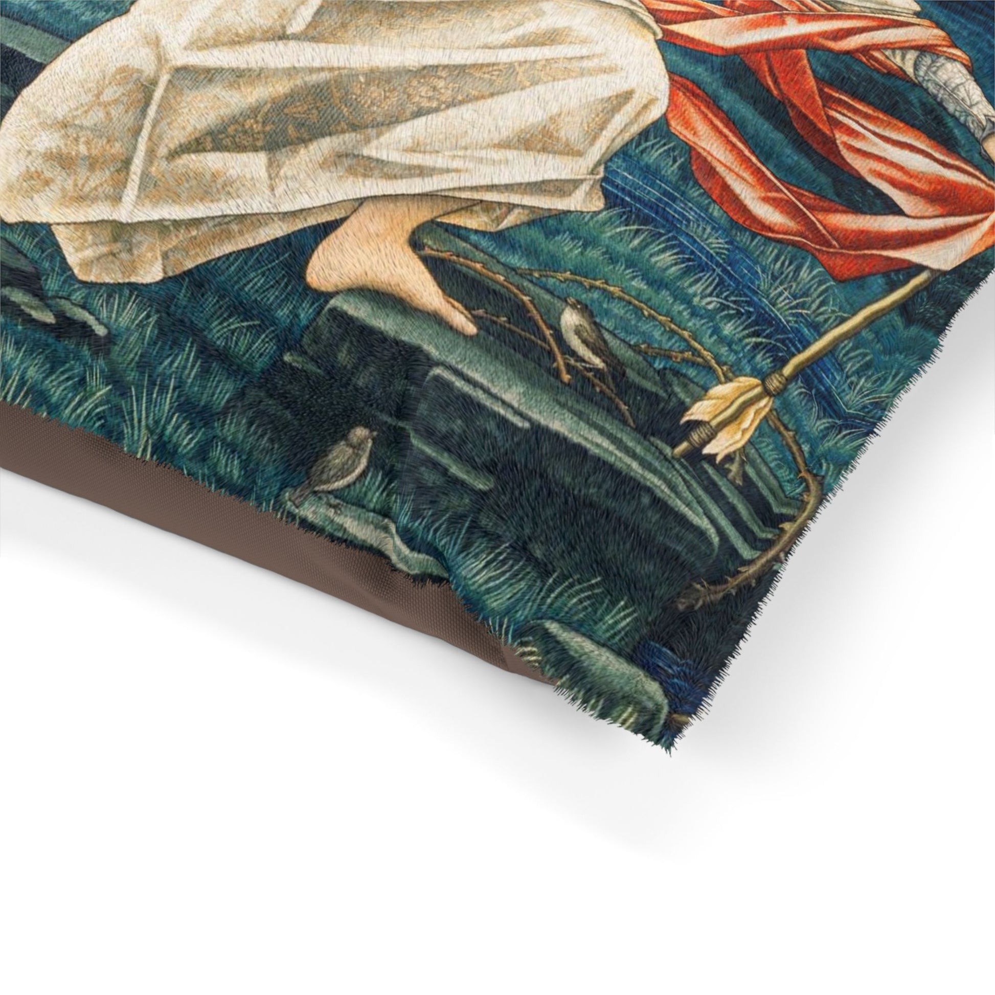 Close-up of a textured fabric with nature-themed design on a white background