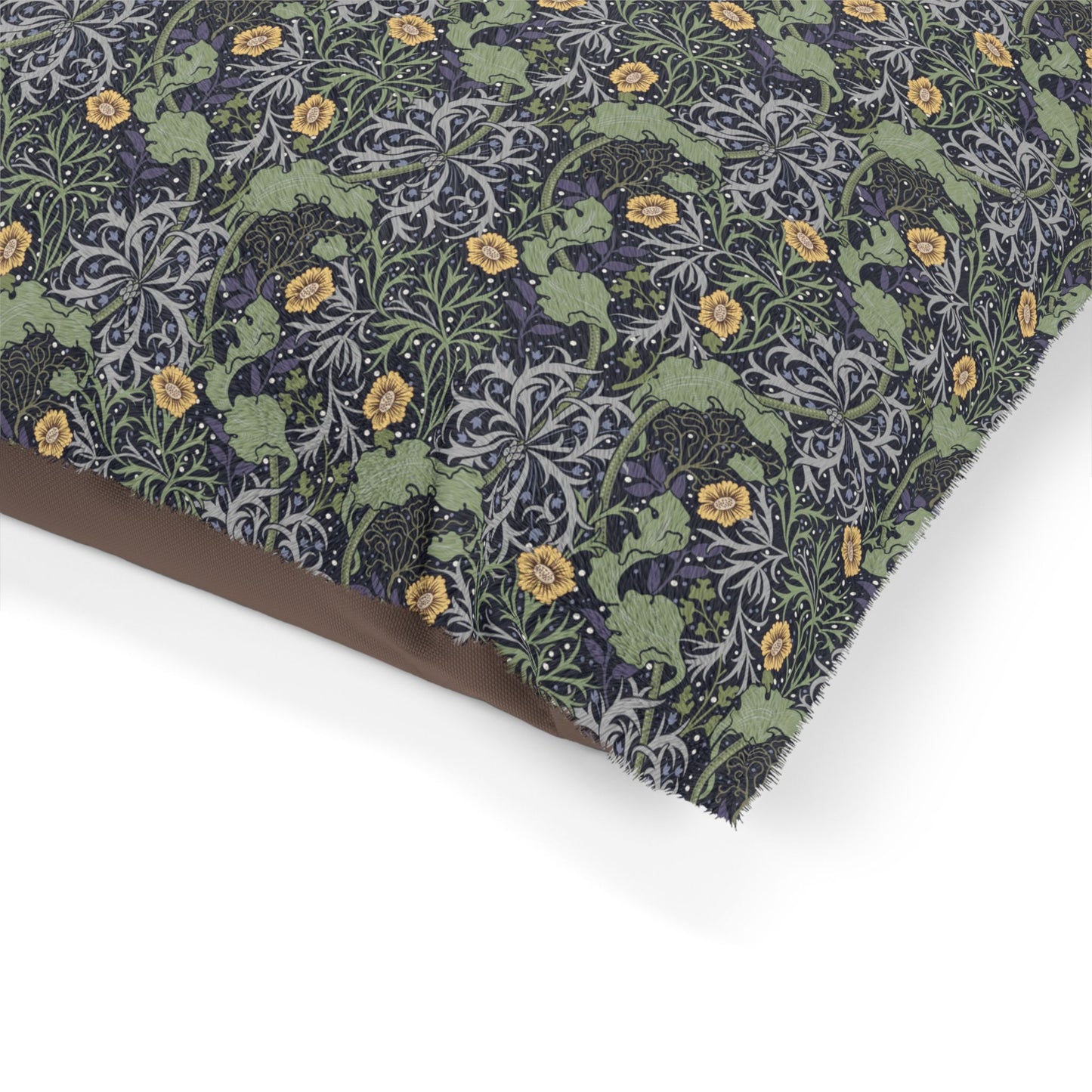 Floral patterned fabric with green, yellow, and brown colors on a white background
