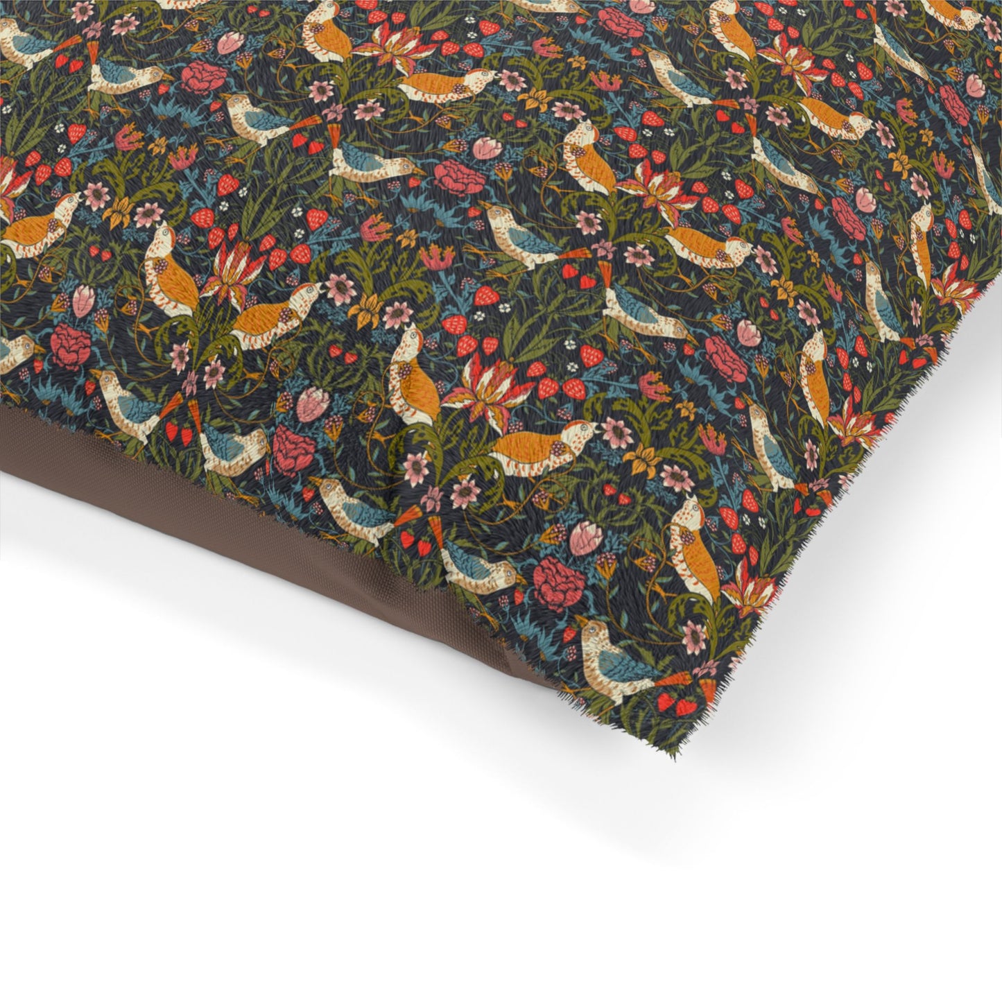 Fabric with a colorful pattern of birds and flowers on a white background