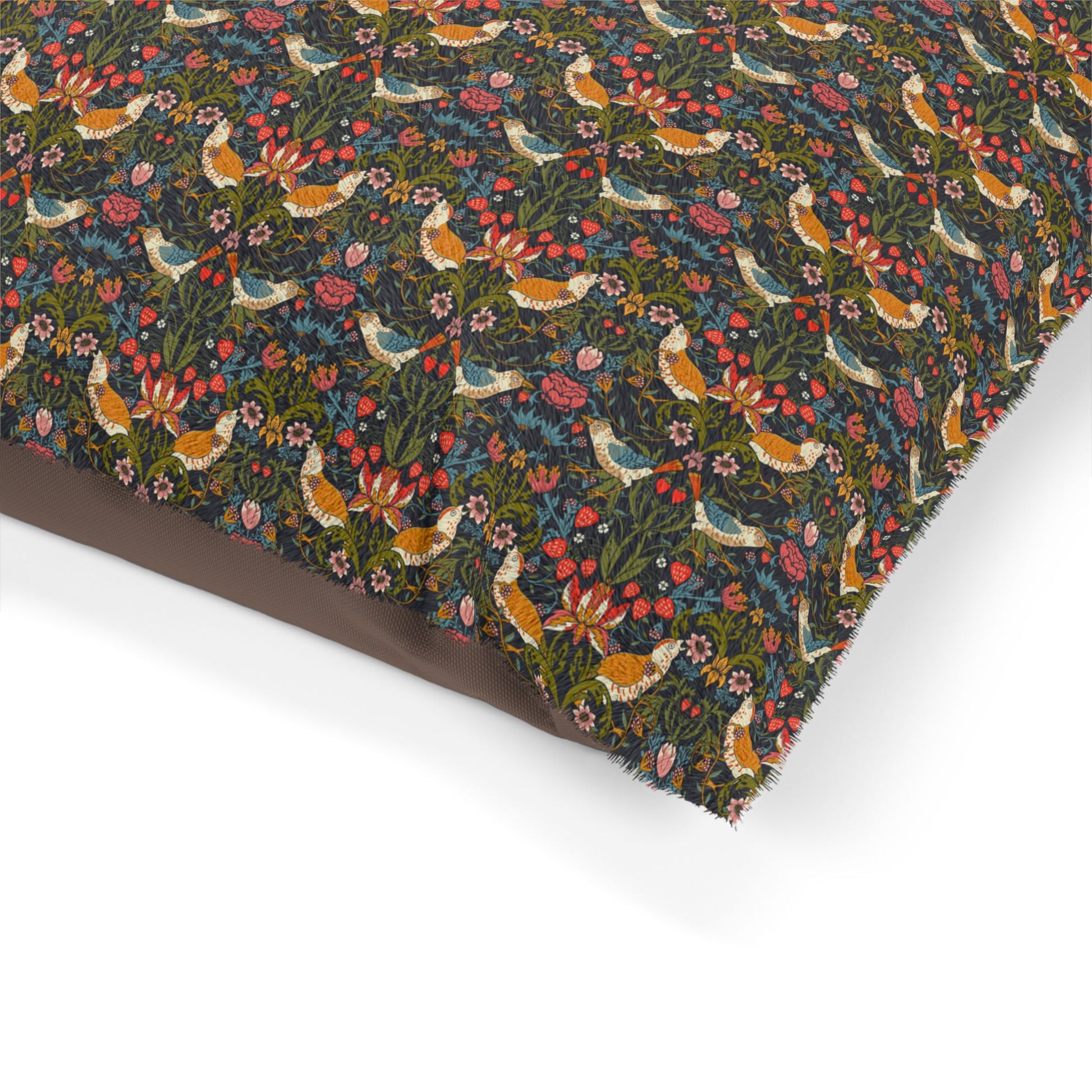 Patterned fabric with birds and flowers on a white background
