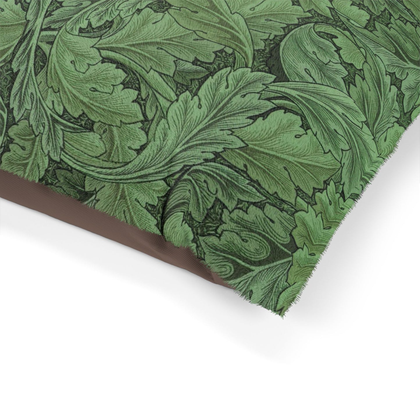 Green leafy patterned paper with a brown border on a white background