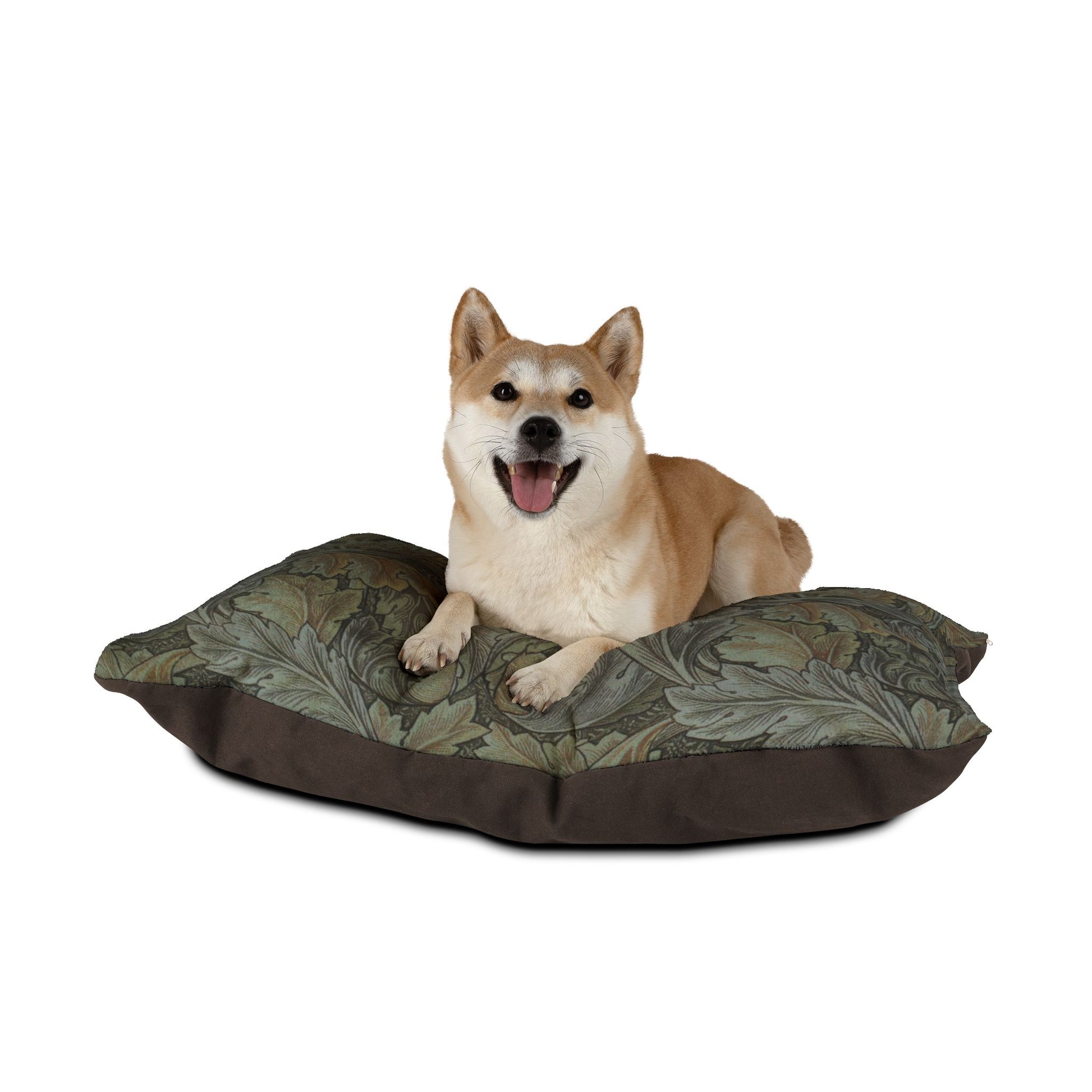 Dog lying on a camouflage-patterned pet bed with a white background