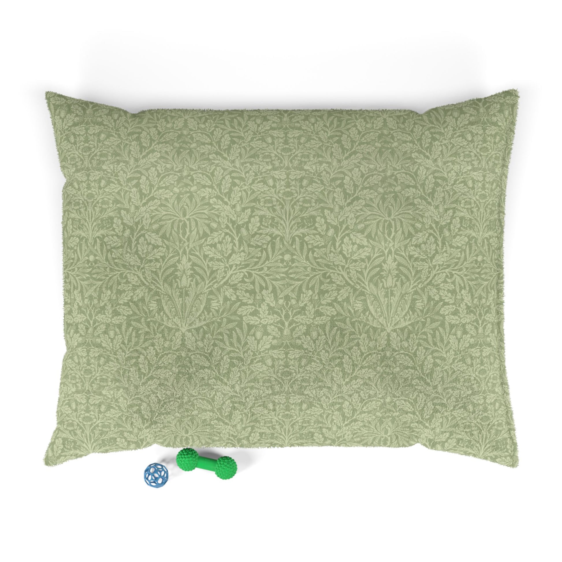 Green patterned dog pillow on a white background