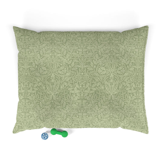 Green patterned dog pillow on a white background