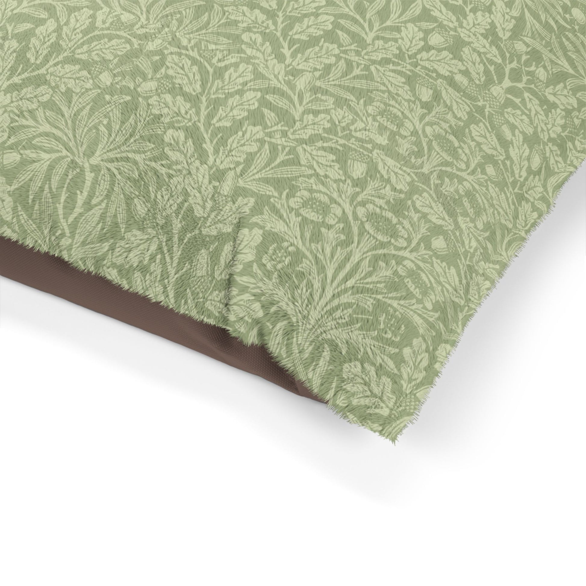 Green leaf patterned fabric on a white background