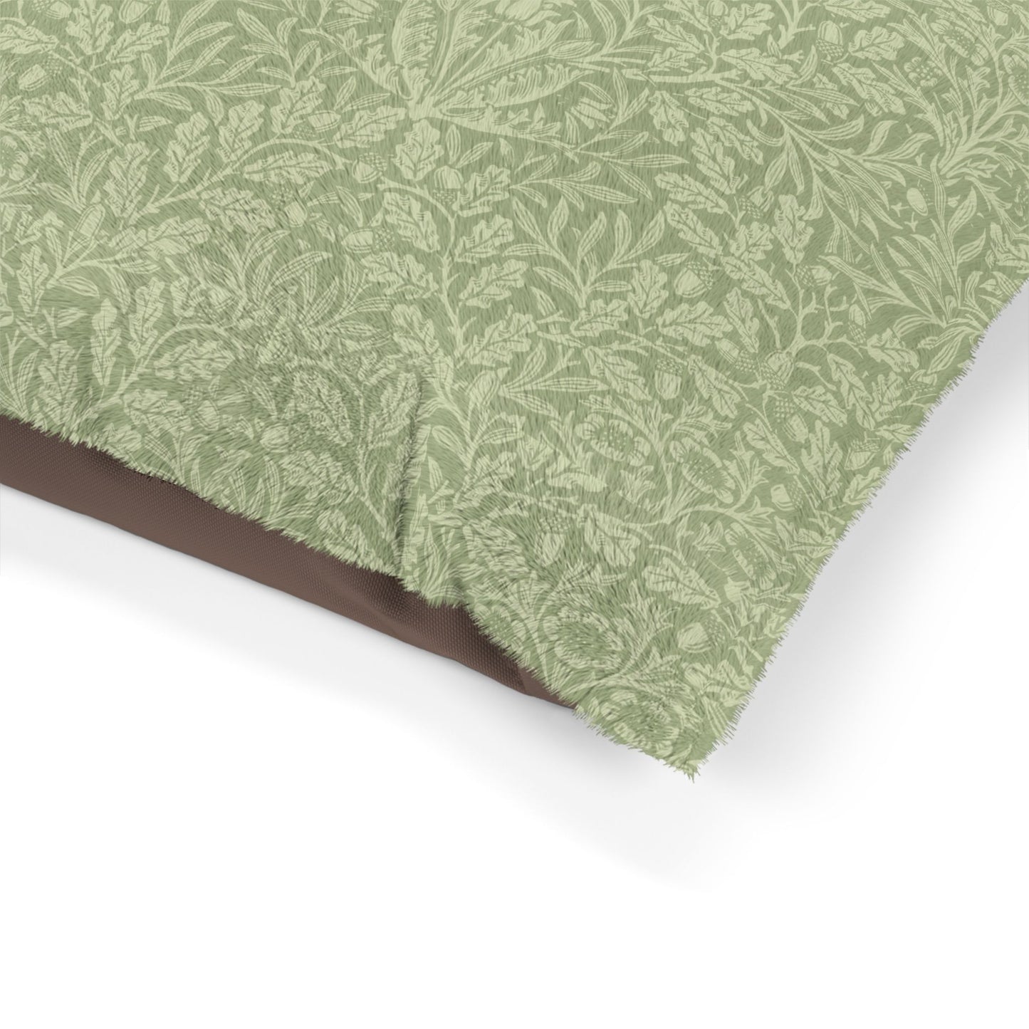 Green leaf patterned fabric on a white background