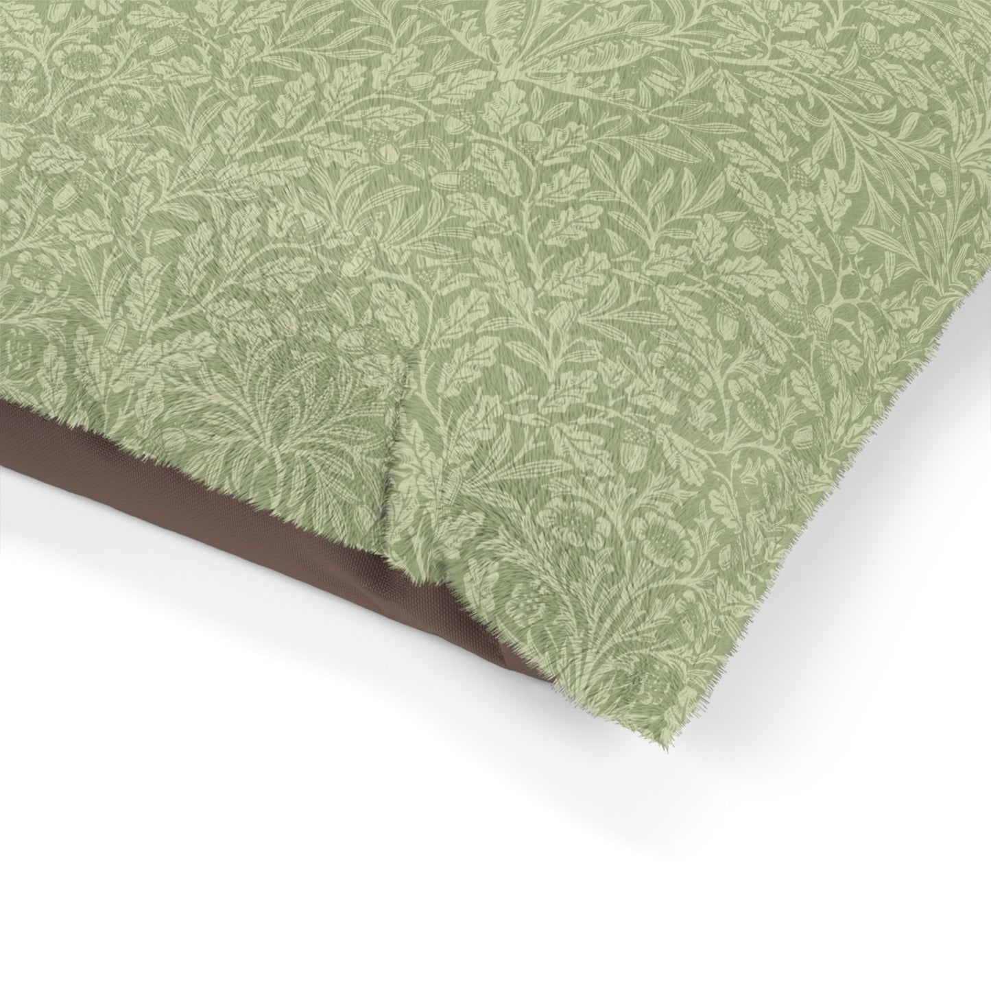 Green fabric with a leaf pattern on a white background