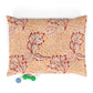 Decorative pillow with floral pattern on a white background