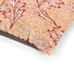 Floral patterned fabric with red and orange design on a white background