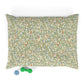 Decorative dog pillow with floral William Morris & Co pattern on a white background