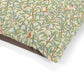 Fabric with a nature-themed William Morris & Co pattern featuring leaves, birds, and flowers on a white background.