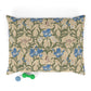 Decorative pillow with William Morris & Co floral pattern on a white background