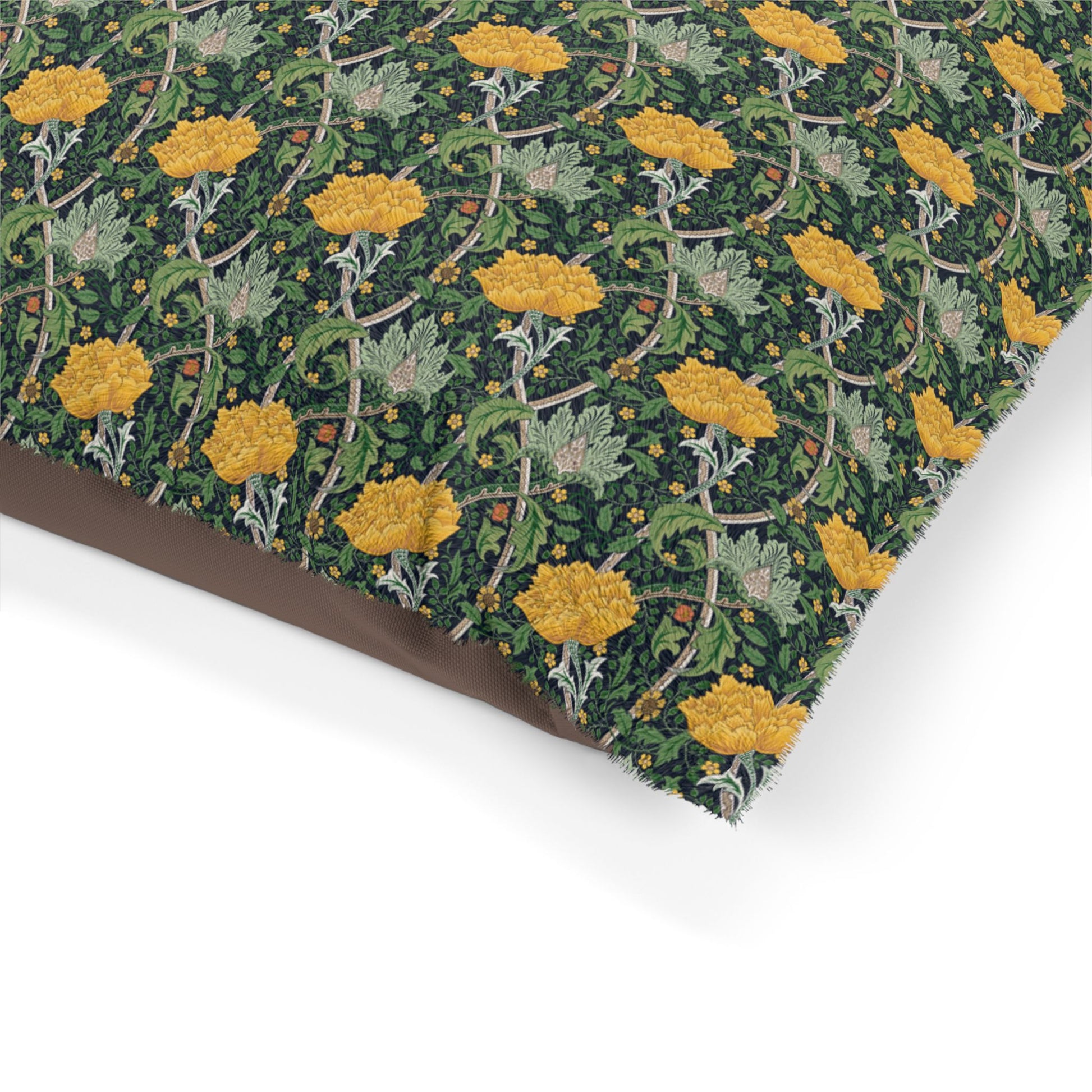 Fabric with a floral pattern featuring yellow flowers and green leaves on a white background