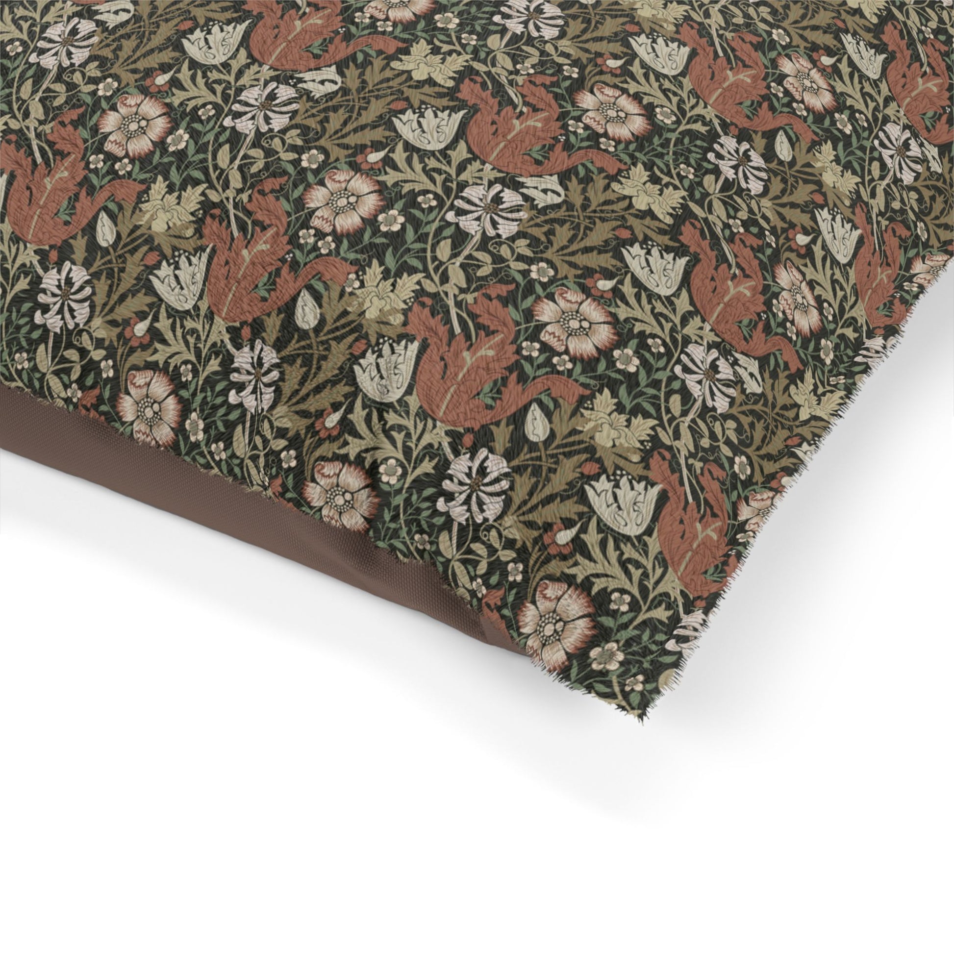 Floral and animal patterned fabric on a white background