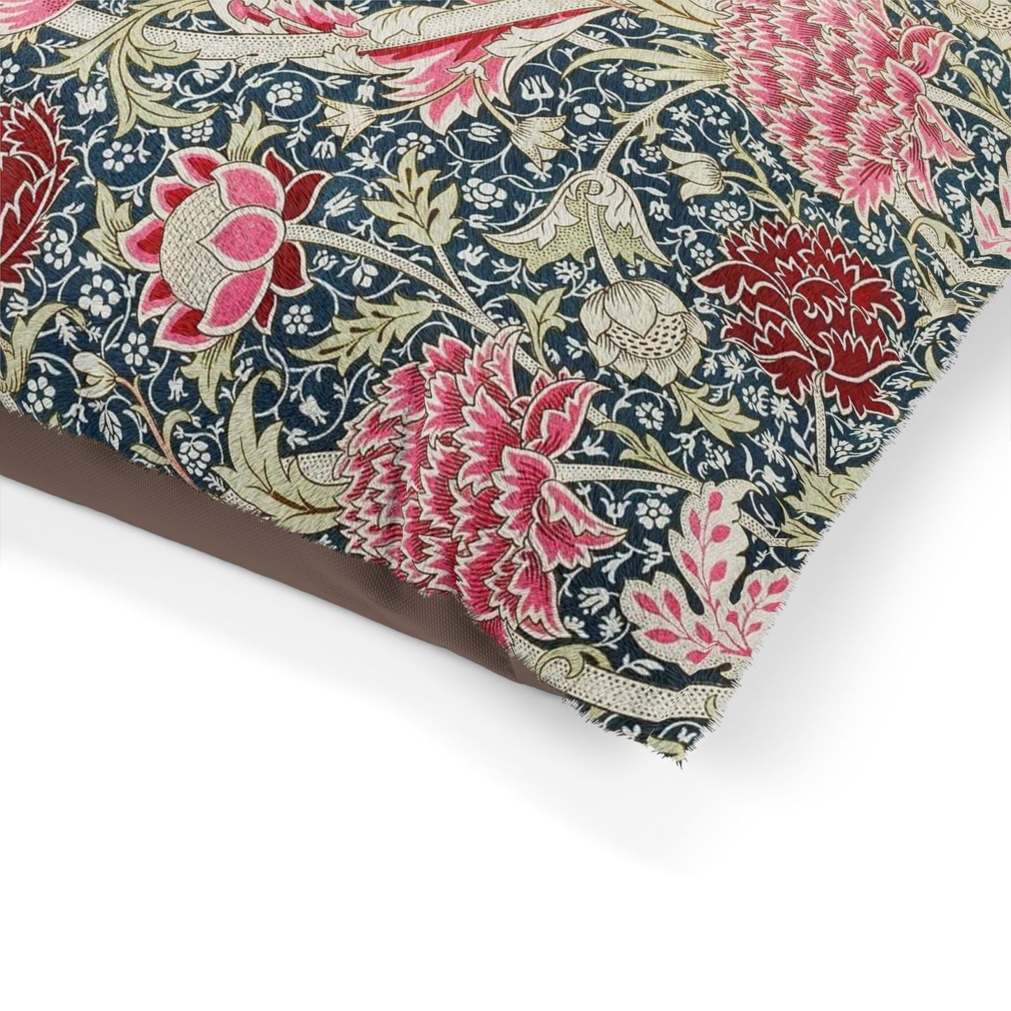 Floral patterned fabric with pink and red flowers on a white background