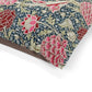 Floral fabric with pink and red flowers on a blue background