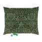 Decorative green pillow with intricate patterns on a white background