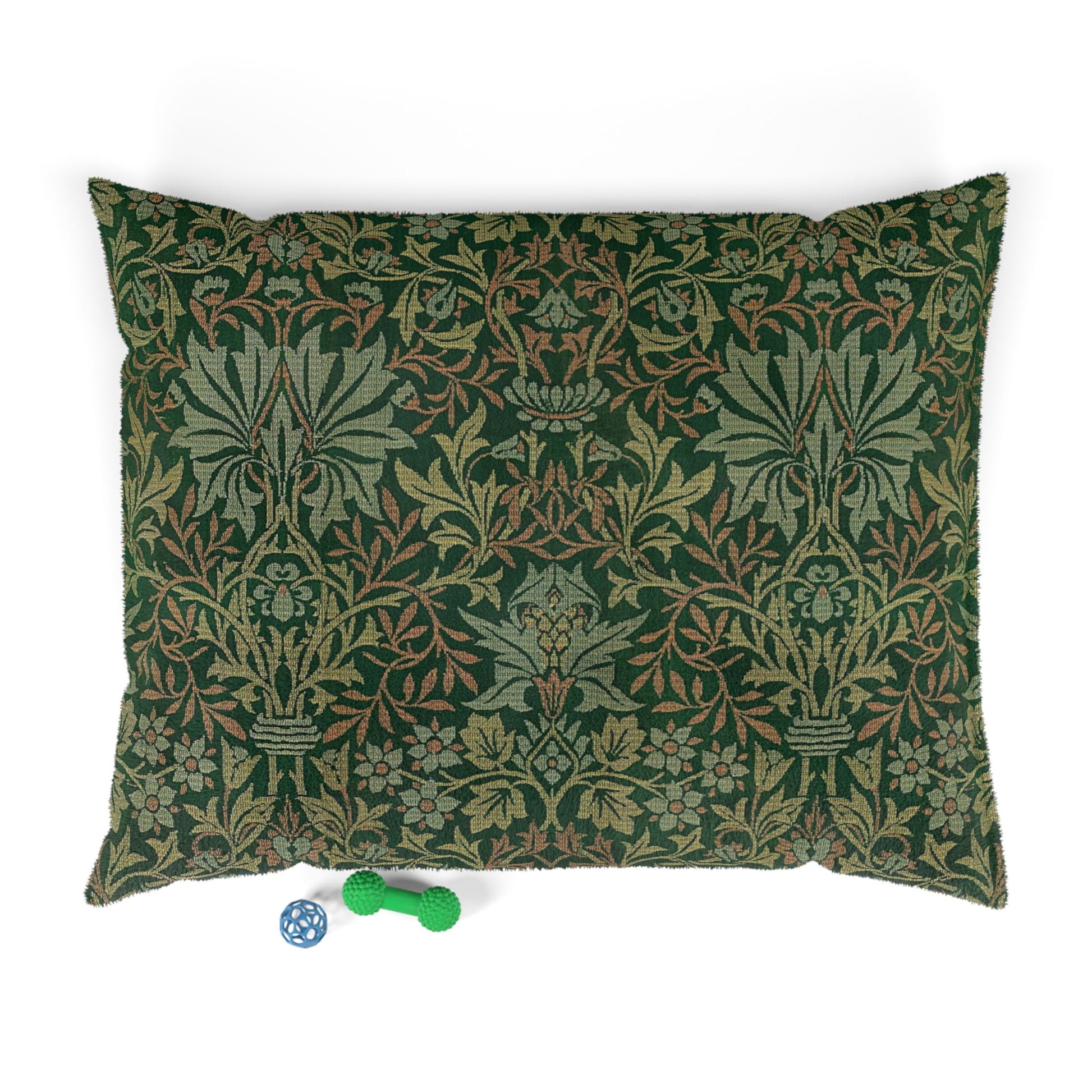 Decorative green pillow with intricate patterns on a white background