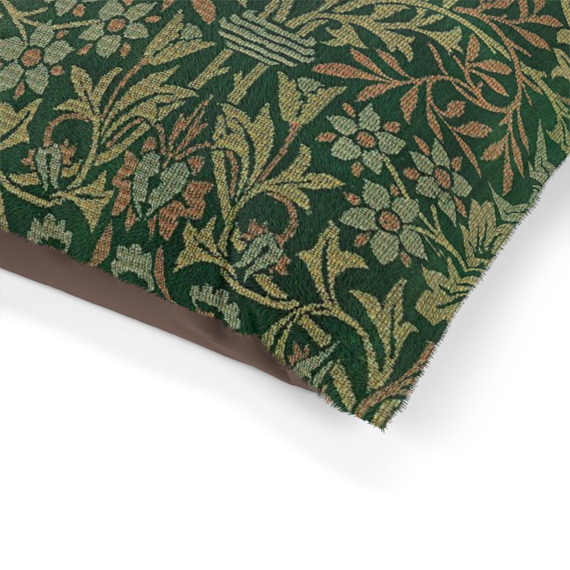 Close-up of a green fabric with a floral pattern on a white background