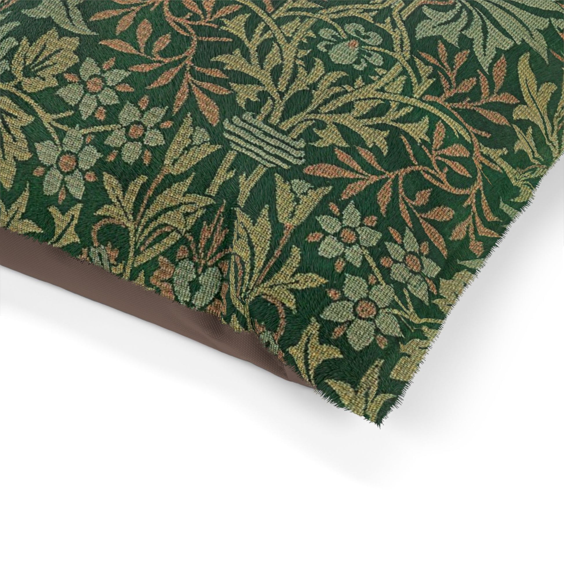 Close-up of green floral patterned fabric on a white background