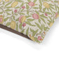 Fabric with a floral pattern featuring peaches and leaves on a white background