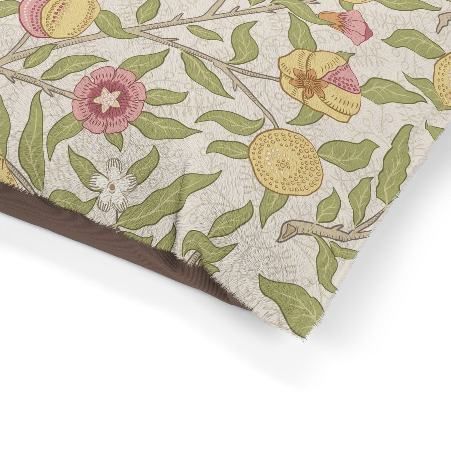 Floral and leaf patterned paper with a brown border on a white background