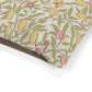 Fabric with a floral and fruit pattern on a white background