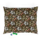 Decorative pillow with floral and animal pattern on a white background